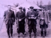 4 individuals with 12 bore rifles and silver Pheasant Trophy