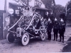 decorated miniature fire engine with firemen