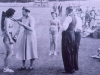 Sash being awarded to 'bathing beauty'