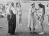Sash being awarded to 'bathing beauty'
